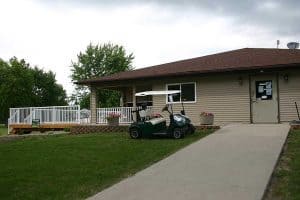 Madelia Golf Course cart and clubhouse
